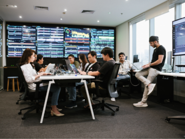 Agoda tech team working with data in the war room